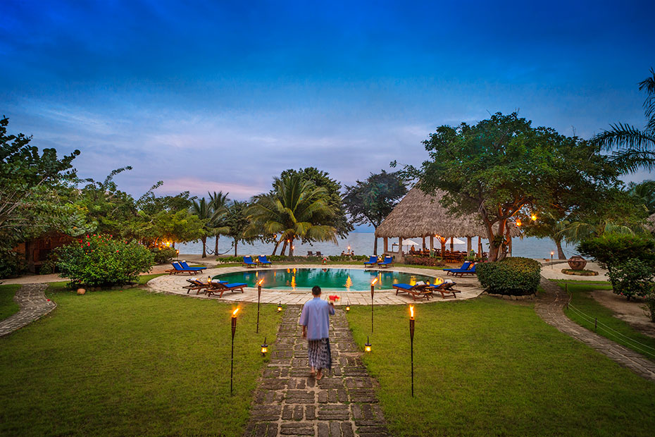 Turtle Inn pool and gardens at dusk