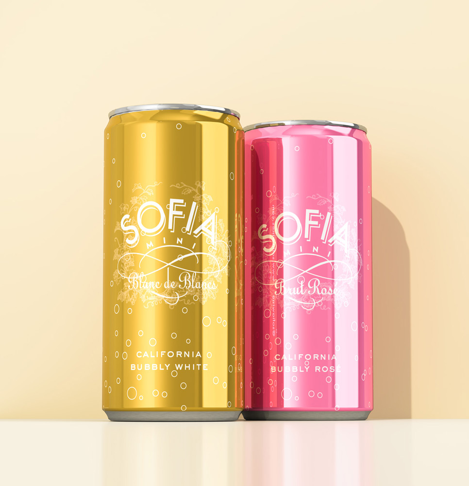 Gold Sofia Mini Blanc de Blancs and pink Brut Rosé cans on a warm background